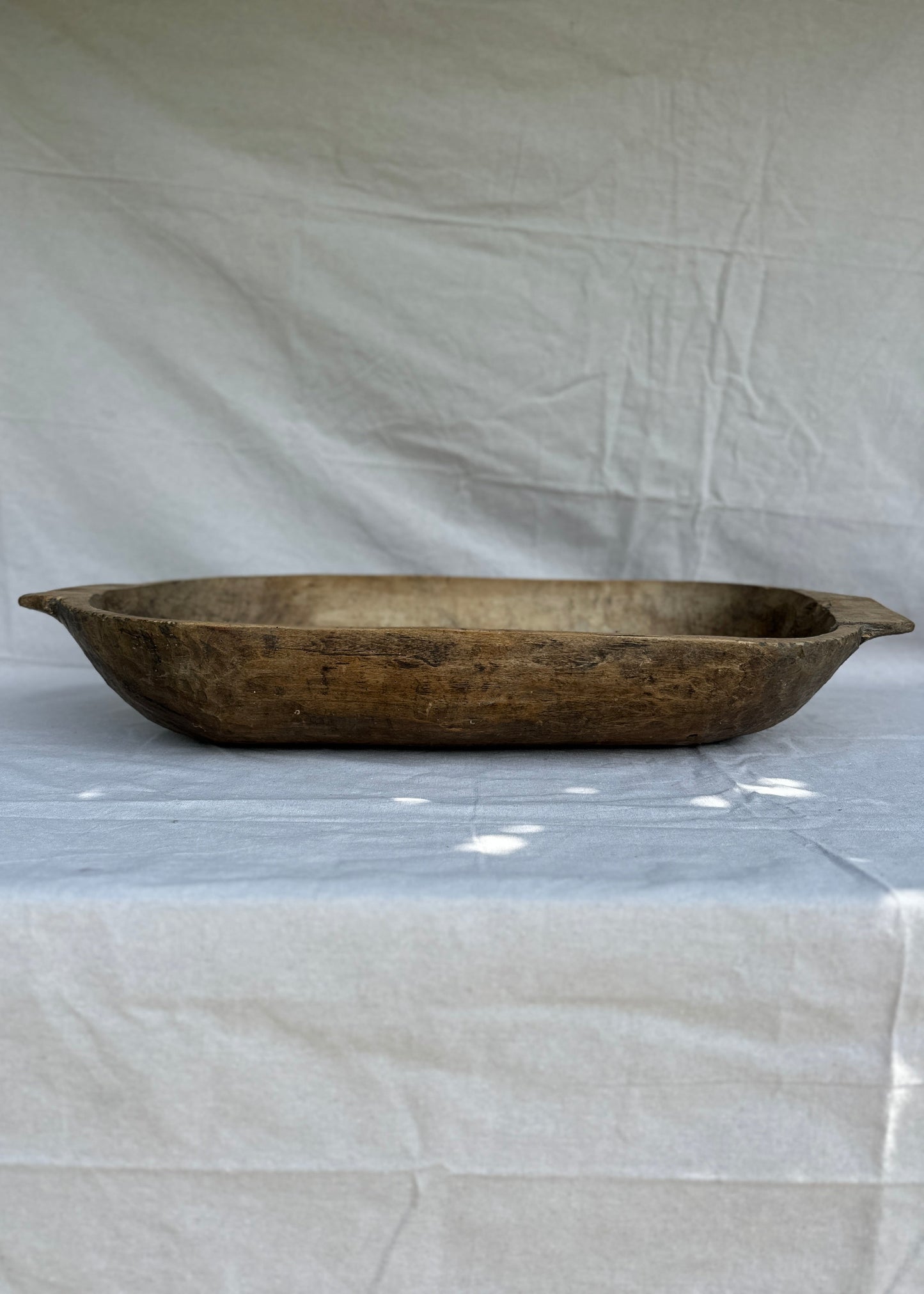 Antique hand-carved wooden trough