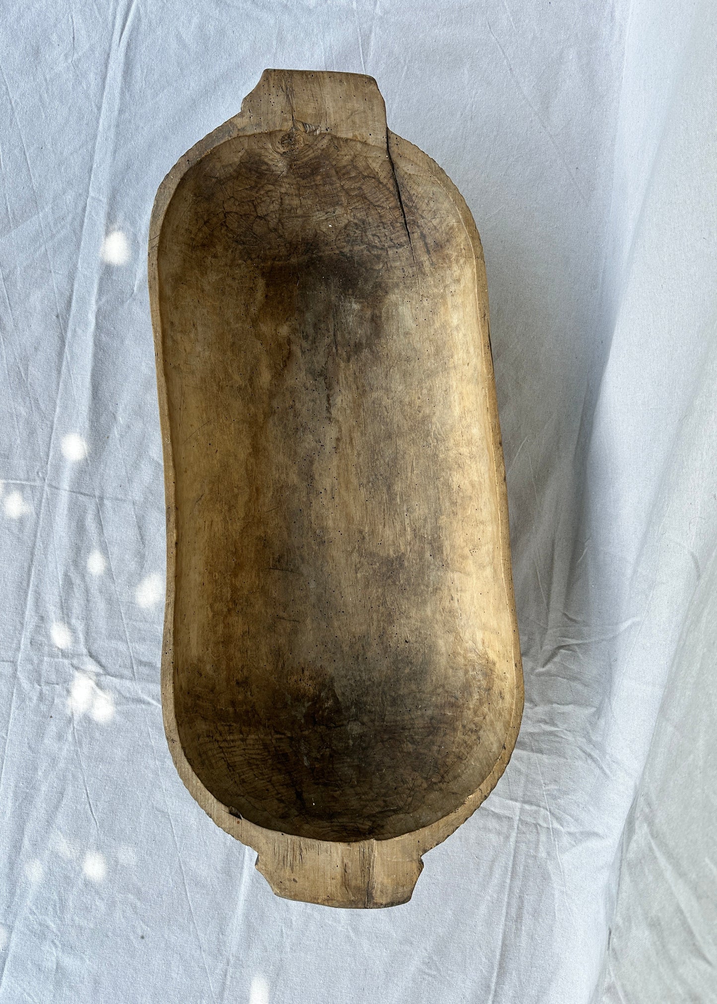 Antique hand-carved wooden trough