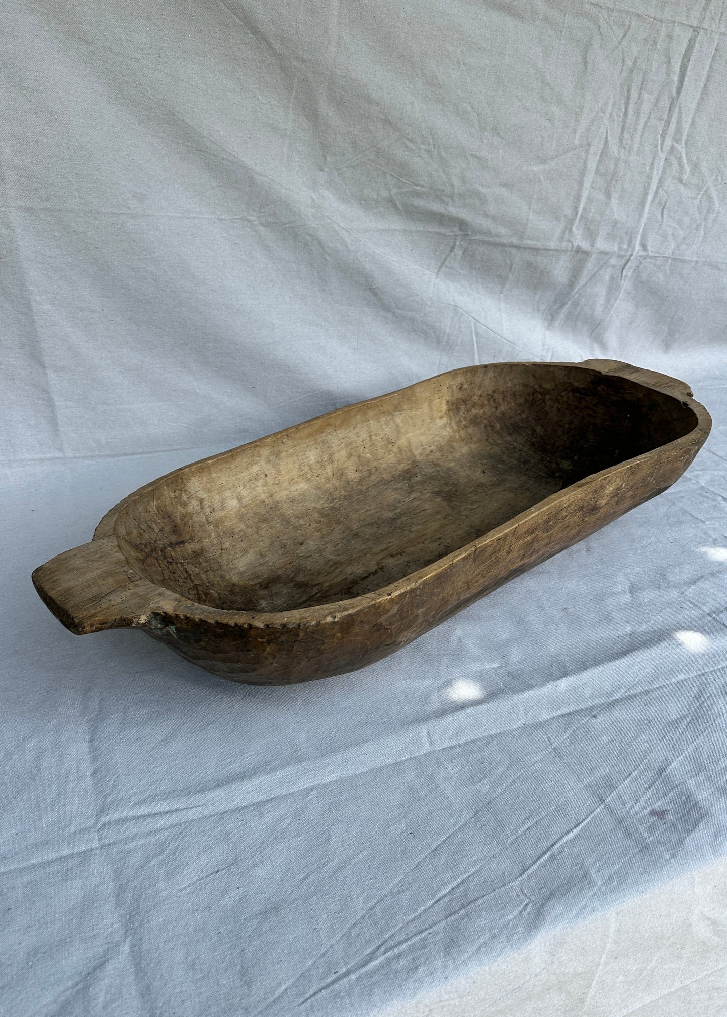 Antique hand-carved wooden trough