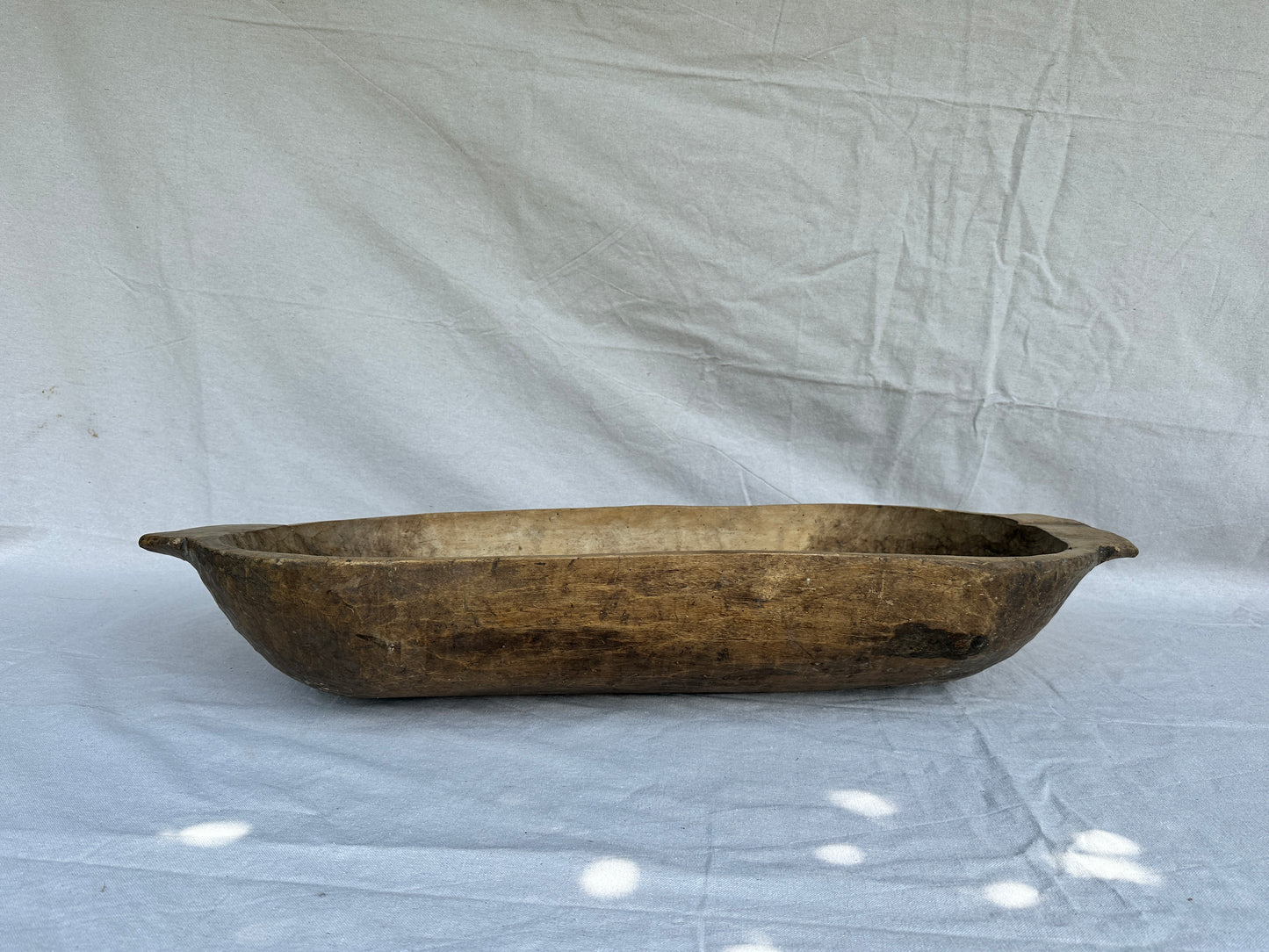 Antique hand-carved wooden trough