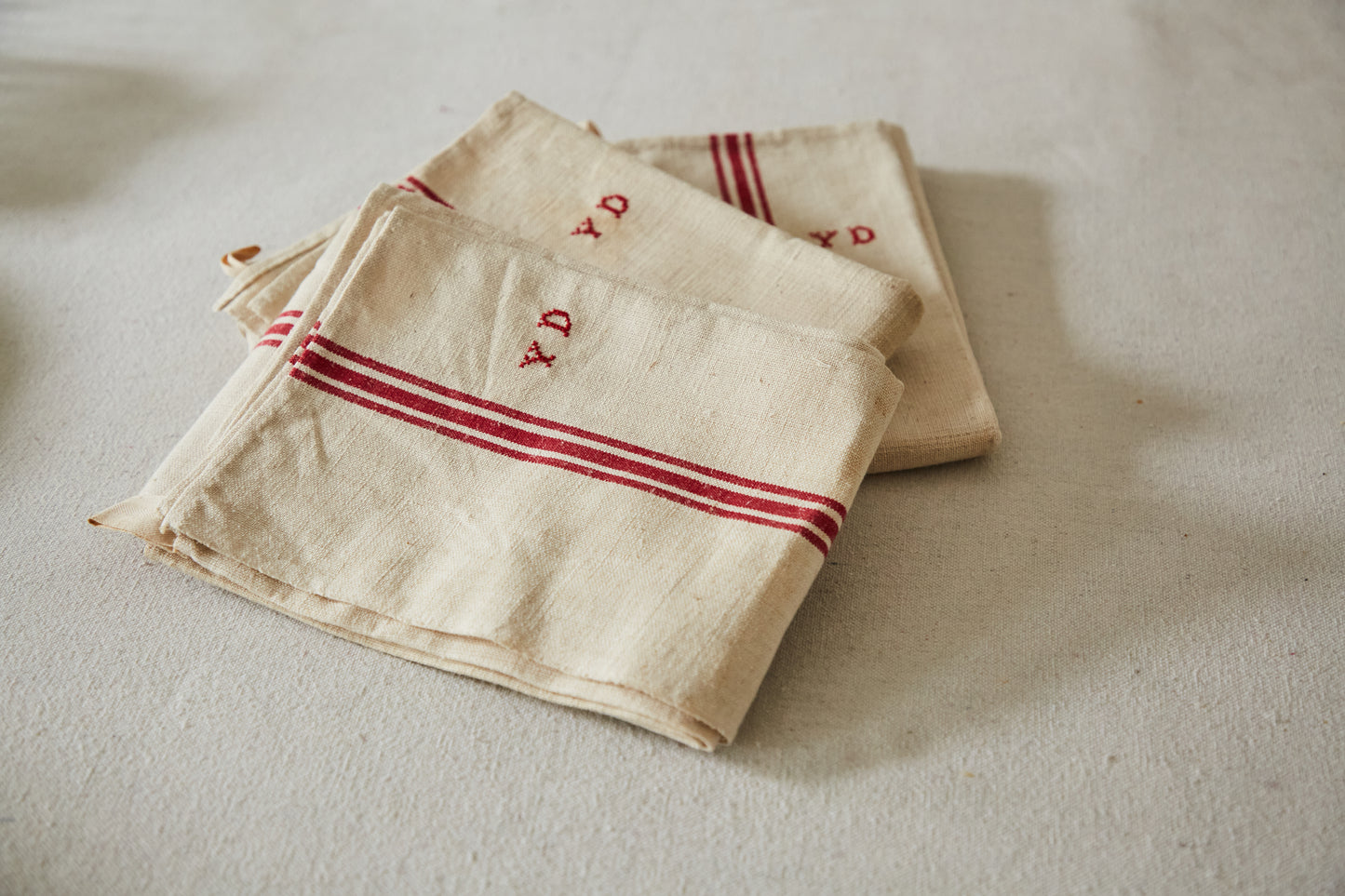 Three tea towels Y D embroidery