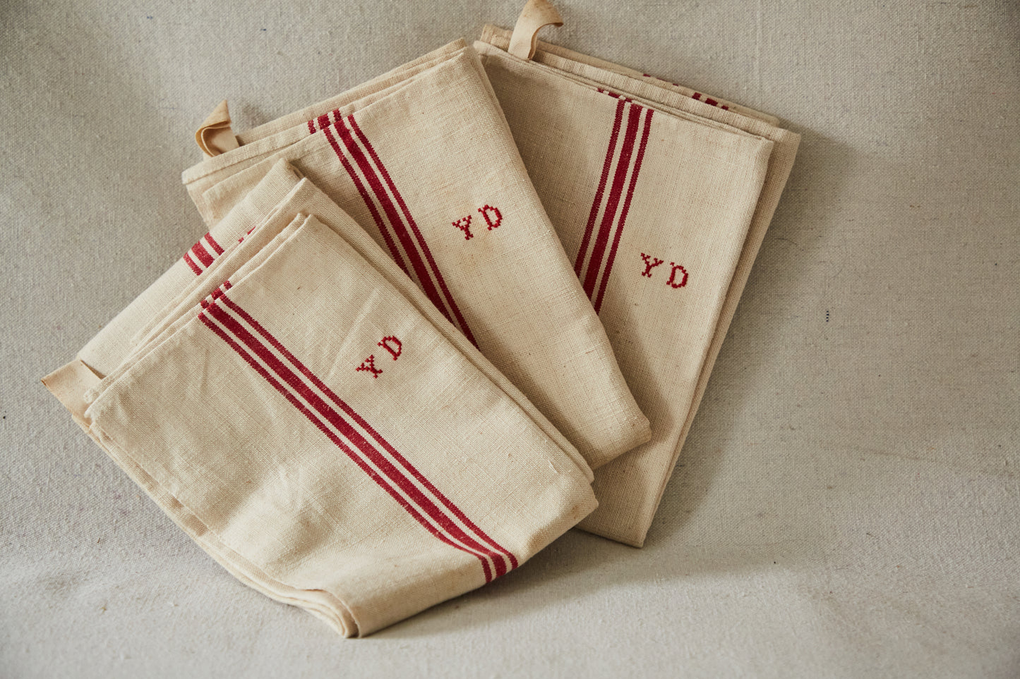 Three tea towels Y D embroidery