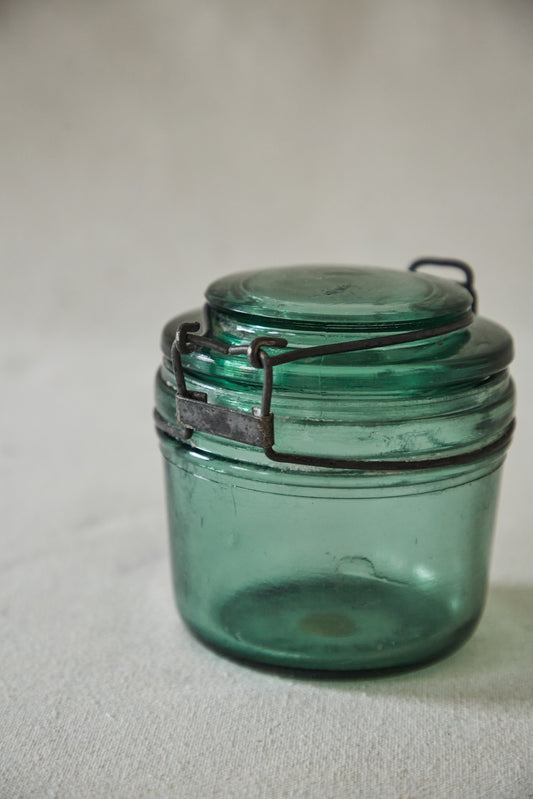 ‘L’ideale’ green glass canister