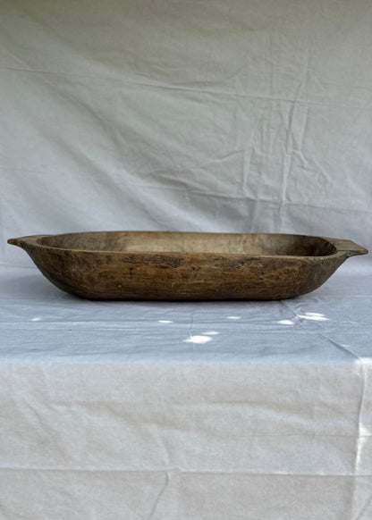 Antique hand-carved wooden trough