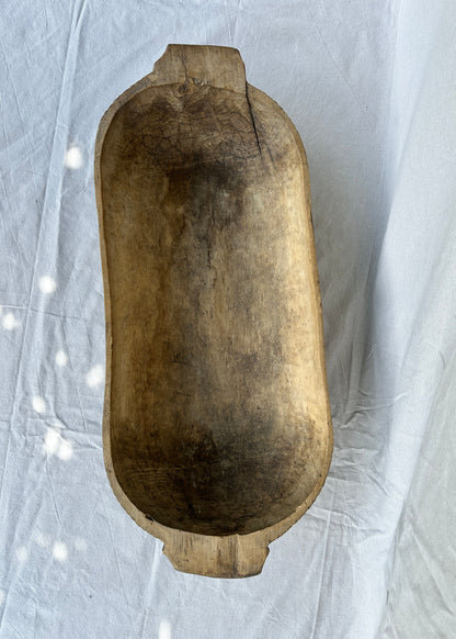 Antique hand-carved wooden trough