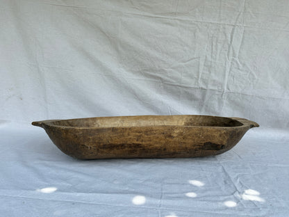 Antique hand-carved wooden trough
